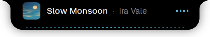 A compact now-playing line in the notch with the song title and artist.